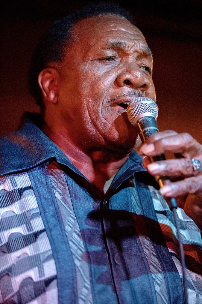 Willie Buck performing live Chicago blues on stage